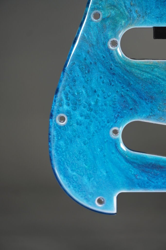 ocean blue resin stratocaster pickguard: neon swirl guitar art