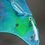 ocean blue resin stratocaster pickguard: neon swirl guitar art