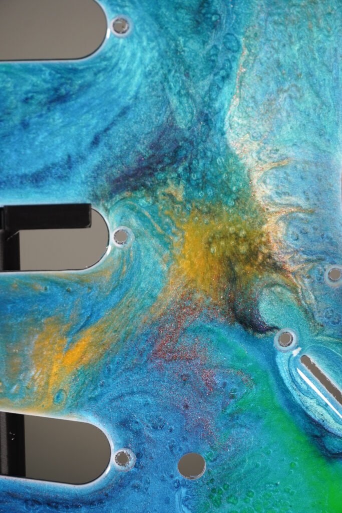 ocean blue resin stratocaster pickguard: neon swirl guitar art