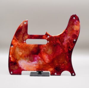inferno crest telecaster pickguard: hand poured resin, red orange gold