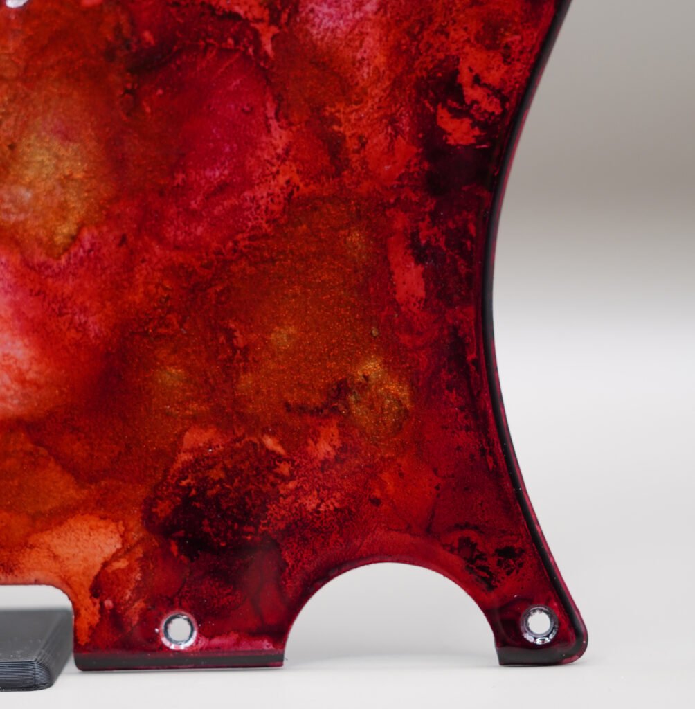 inferno crest telecaster pickguard: hand poured resin, red orange gold
