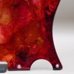 inferno crest telecaster pickguard: hand poured resin, red orange gold