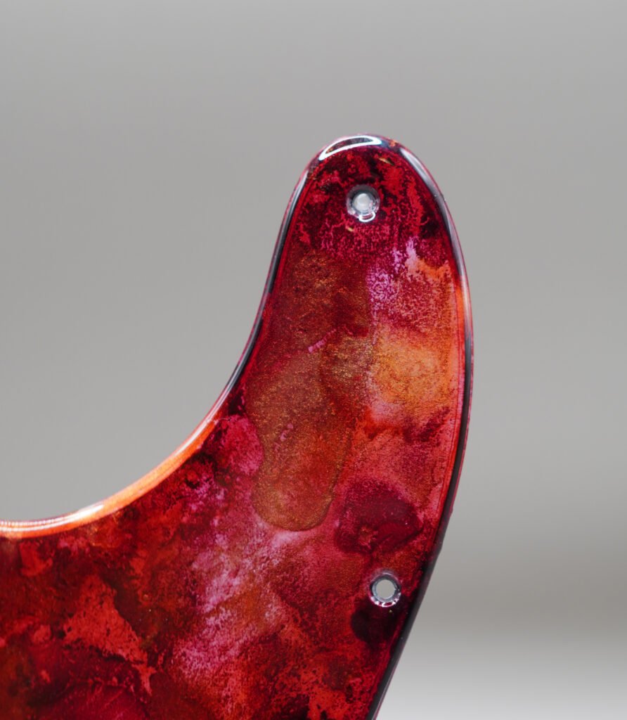 inferno crest telecaster pickguard: hand poured resin, red orange gold