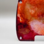 inferno crest telecaster pickguard: hand poured resin, red orange gold