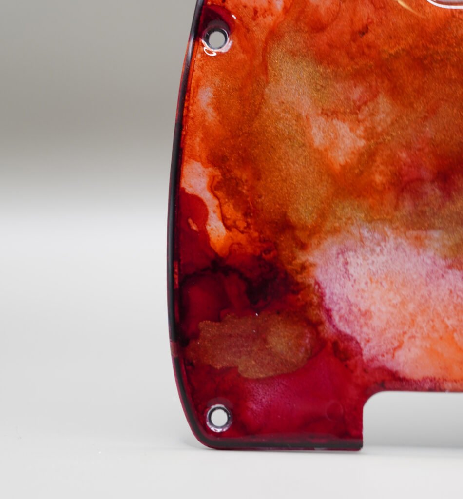inferno crest telecaster pickguard: hand poured resin, red orange gold
