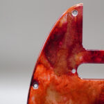 inferno crest telecaster pickguard: hand poured resin, red orange gold