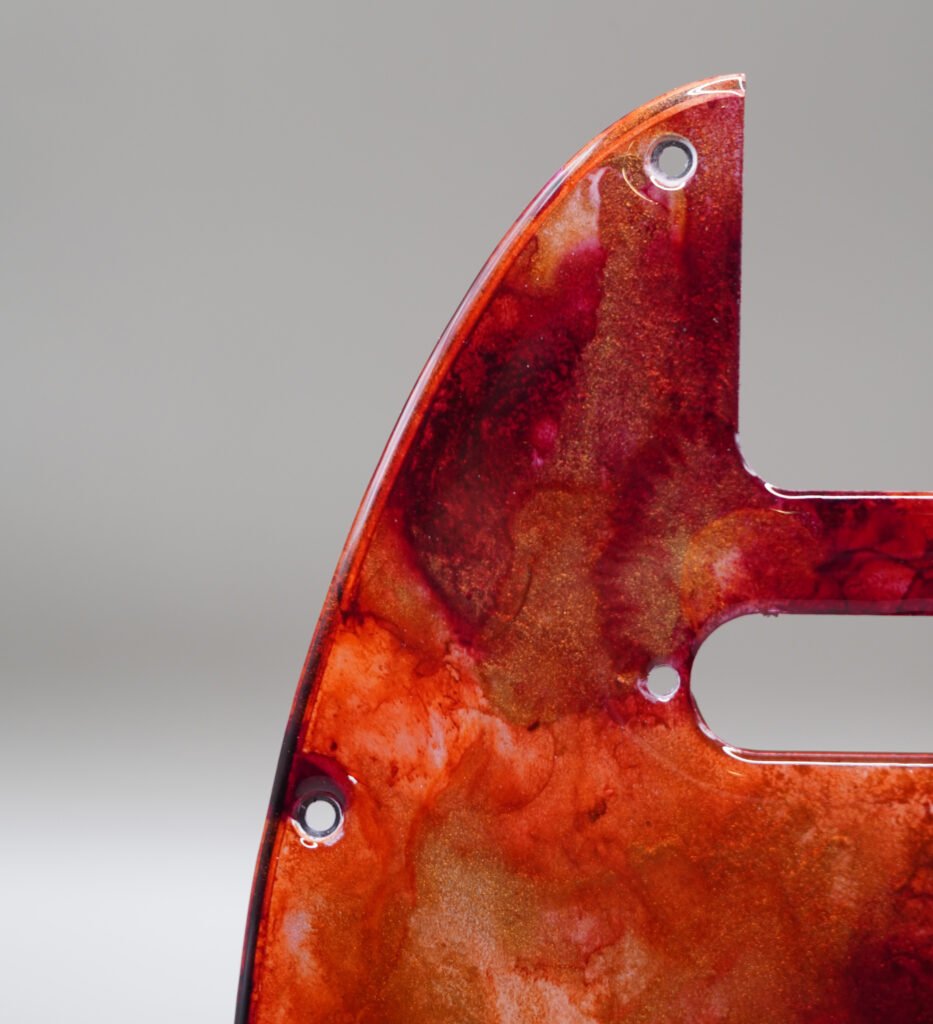 inferno crest telecaster pickguard: hand poured resin, red orange gold