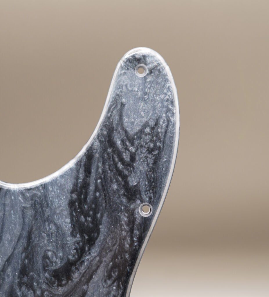handcrafted resin telecaster pickguard: silver & black marble design